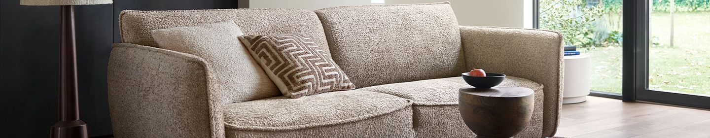 Lees in onze blog tips voor een stijlvol huis | bouclé stof woontrends | Woonboulevard Poortvliet XXL